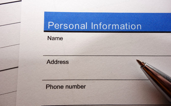 Close up a form eliciting personal information.